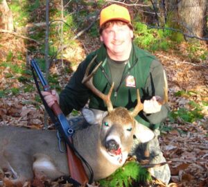 Dan Ladd outdoor writers shows off deer kill